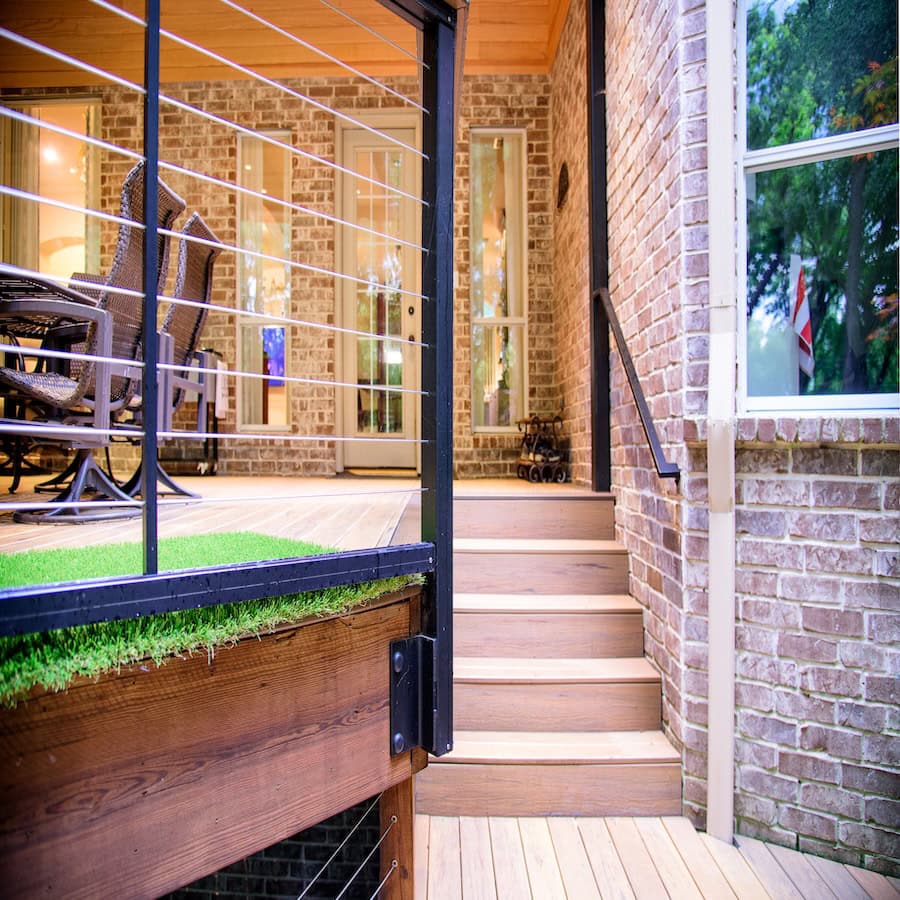 custom deck railing ironwork in dfw built by Southwest Fence & Deck, Inc
