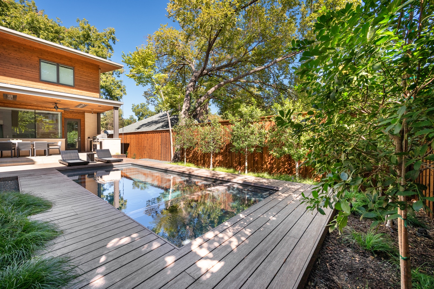 Custom wood deck installation in DFW by Southwest Fence and Deck.